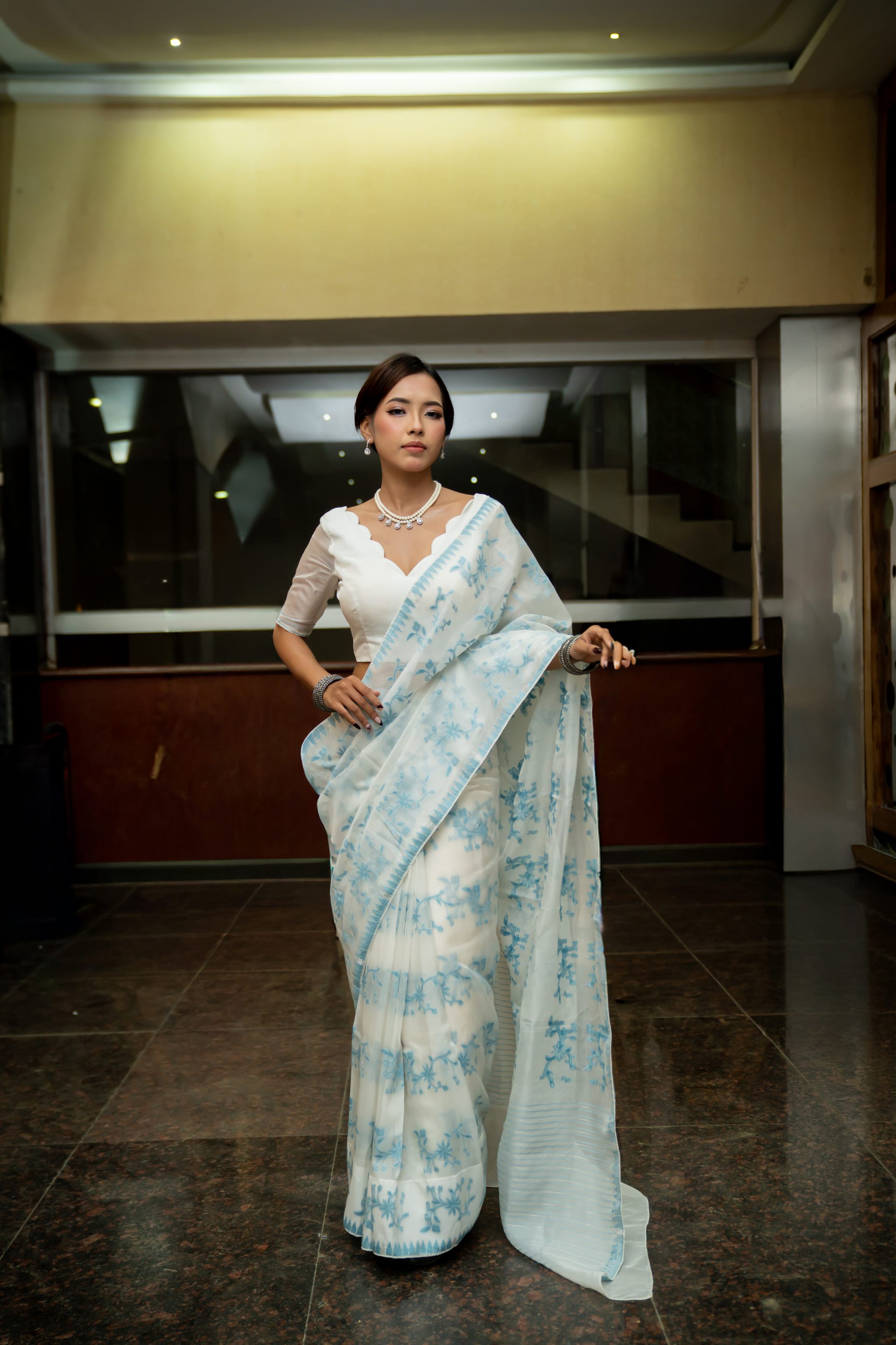 Leikol Saree – Sky Blue on White
